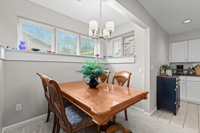 21112 Boulder Cir, Northville, MI 48167 - dining room featuring a chandelier, bar area, light colored carpet, and recessed lighting