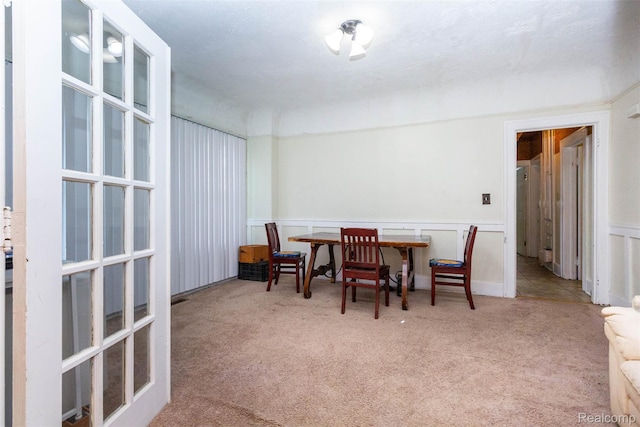 318 Chandler St, Detroit, MI 48202 - carpeted dining area featuring a wainscoted wall