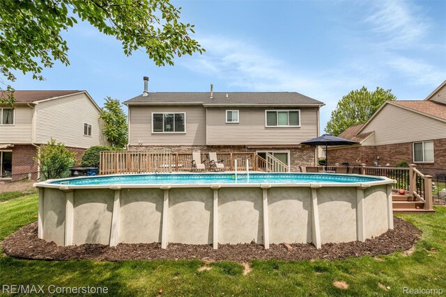 1232 Michael Dr, Westland, MI 48186 - view of swimming pool with a deck and a yard