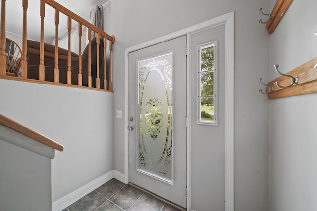 4787 Hooks Mill Rd, Adrian, MI 49221 - foyer featuring dark tile patterned floors and baseboards