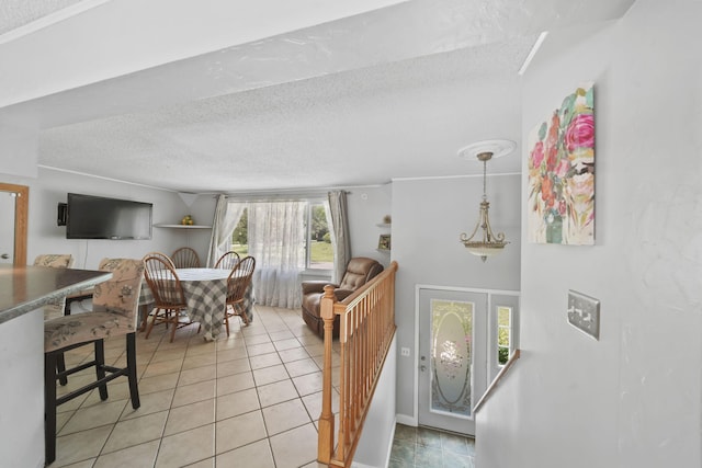 4787 Hooks Mill Rd, Adrian, MI 49221 - dining area featuring a textured ceiling and light tile patterned floors