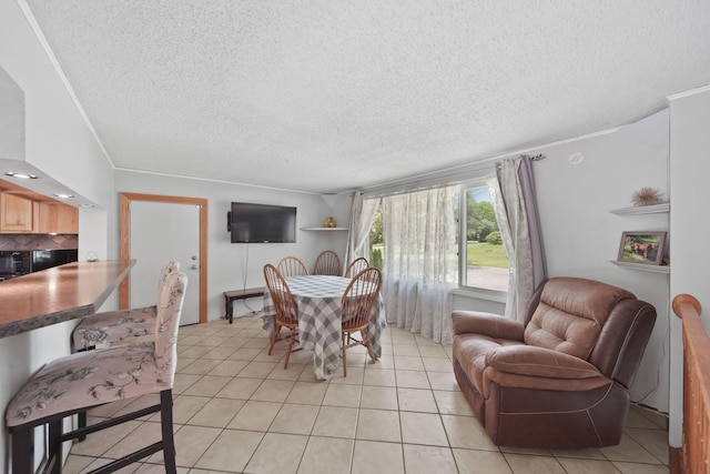 4787 Hooks Mill Rd, Adrian, MI 49221 - dining space with a textured ceiling and light tile patterned flooring