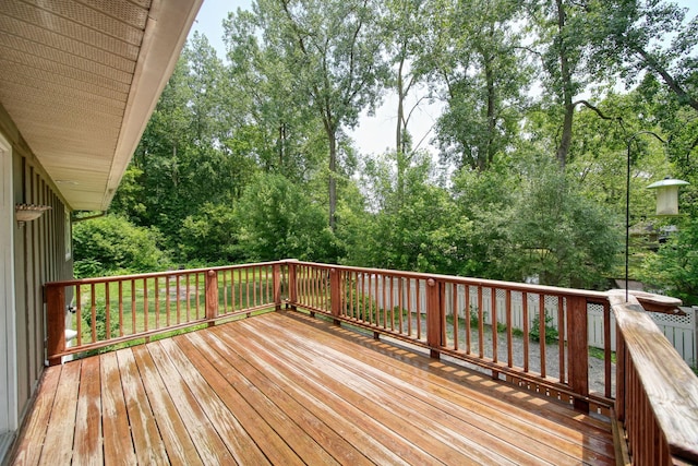 4787 Hooks Mill Rd, Adrian, MI 49221 - wooden deck featuring view of wooded area