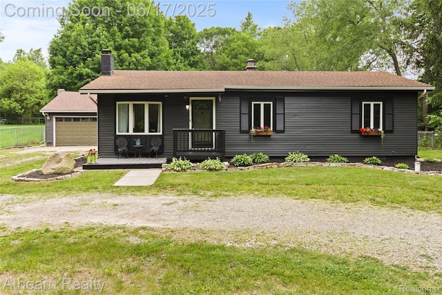 10129 Nimphie Rd, Fenton, MI 48430 - single story home featuring covered porch, a chimney, roof with shingles, and a garage