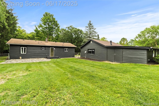 10129 Nimphie Rd, Fenton, MI 48430 - rear view of property featuring a patio area