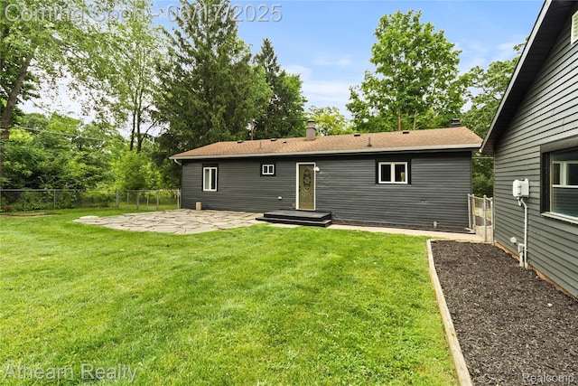 10129 Nimphie Rd, Fenton, MI 48430 - back of property with a patio area