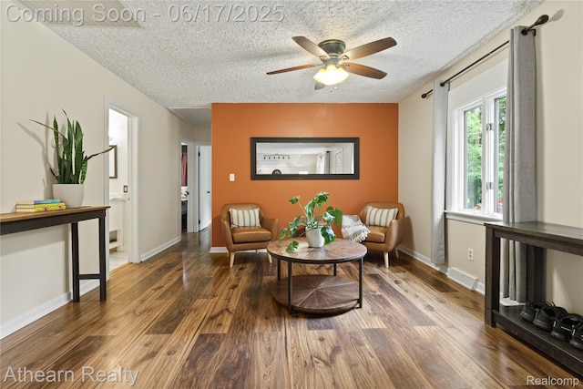 10129 Nimphie Rd, Fenton, MI 48430 - sitting room featuring wood finished floors, a textured ceiling, and a ceiling fan