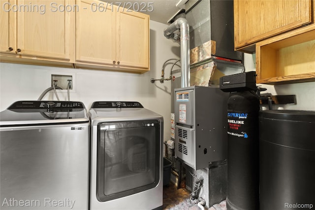 10129 Nimphie Rd, Fenton, MI 48430 - washroom featuring cabinet space and independent washer and dryer