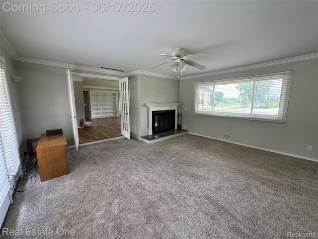 3340 Chickering Ln, Bloomfield Hills, MI 48302 - unfurnished living room with ceiling fan, crown molding, carpet, and a glass covered fireplace