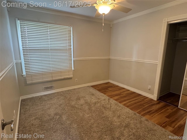 3340 Chickering Ln, Bloomfield Hills, MI 48302 - unfurnished bedroom featuring wood finished floors, ornamental molding, a closet, and ceiling fan