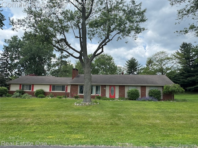 3340 Chickering Ln, Bloomfield Hills, MI 48302 - ranch-style house featuring brick siding, a chimney, and a front yard