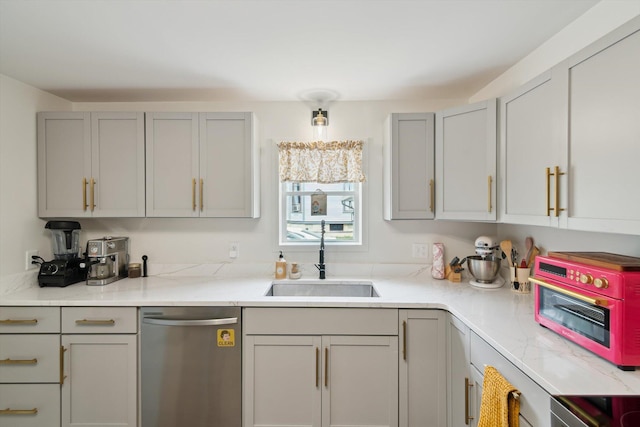 217 S Marshall Ave, Marshall, MI 49068 - kitchen with stainless steel dishwasher, gray cabinets, and light countertops