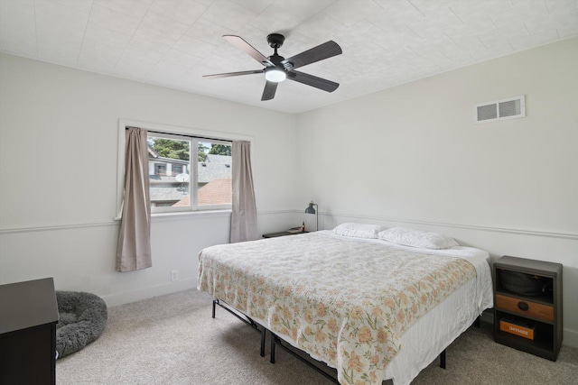 217 S Marshall Ave, Marshall, MI 49068 - carpeted bedroom with a ceiling fan and baseboards