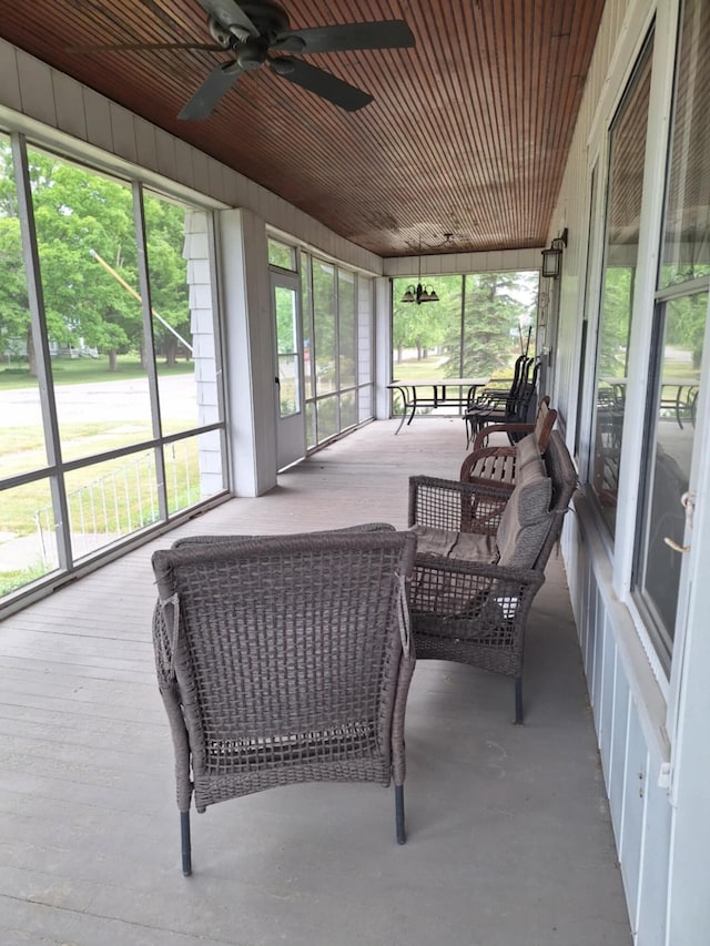 624 N Main St, Evart, MI 49631 - sunroom / solarium featuring a ceiling fan and healthy amount of natural light