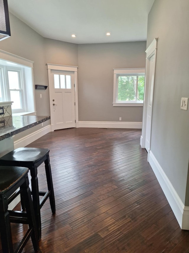 624 N Main St, Evart, MI 49631 - entrance foyer with dark wood-style floors and recessed lighting