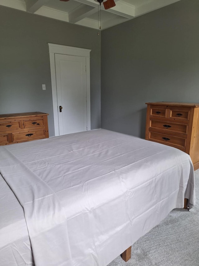 624 N Main St, Evart, MI 49631 - bedroom featuring carpet floors, beam ceiling, ceiling fan, and coffered ceiling