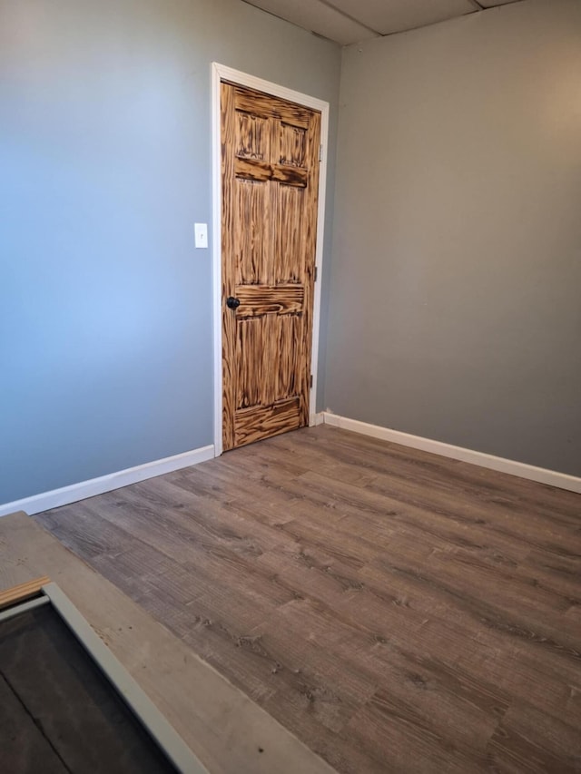 624 N Main St, Evart, MI 49631 - empty room featuring wood finished floors
