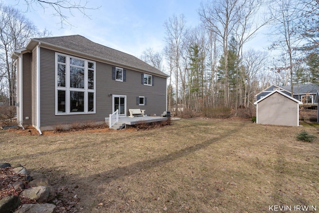 19223 Fox Glove Cir, Big Rapids, MI 49307 - rear view of house with a yard, a deck, a shed, and roof with shingles
