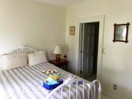 44 N Main St, Quincy, MI 49082 - bedroom featuring baseboards