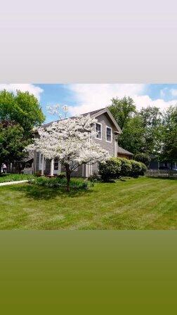 44 N Main St, Quincy, MI 49082 - view of property exterior with a yard