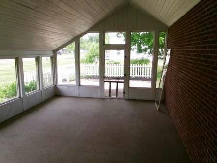 44 N Main St, Quincy, MI 49082 - unfurnished sunroom with vaulted ceiling