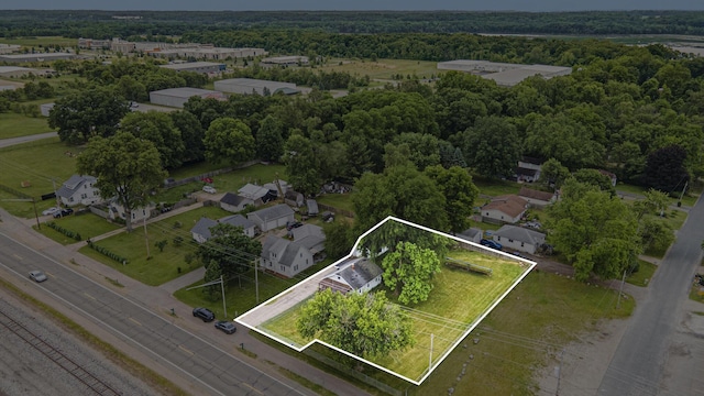 8464 E Michigan Ave, Galesburg, MI 49053 - aerial overview of property's location featuring property parcel outlined and a forest