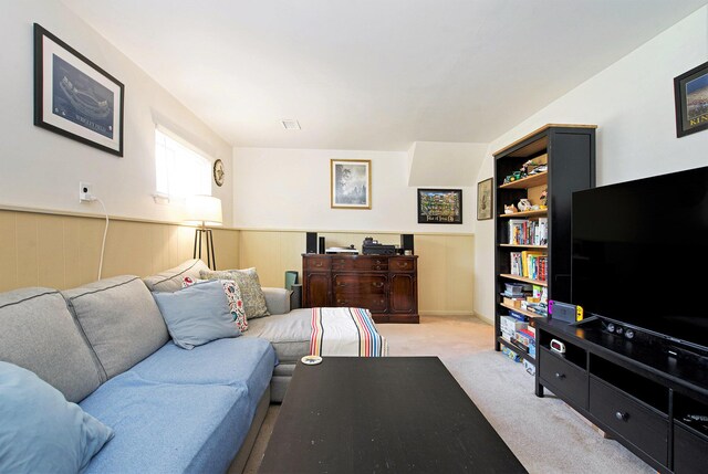 8683 Hemlock Ct, Ypsilanti, MI 48198 - living area with carpet flooring and a wainscoted wall