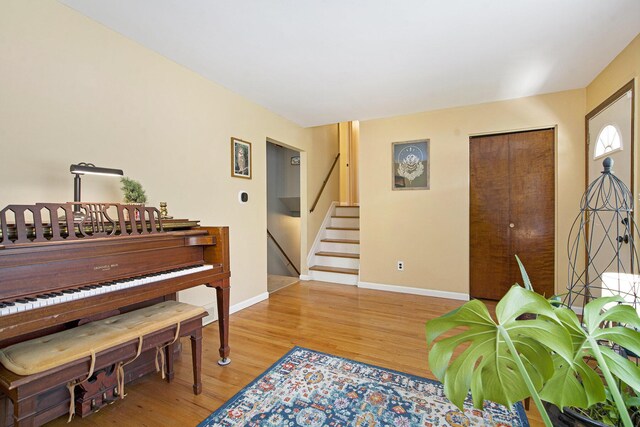 8683 Hemlock Ct, Ypsilanti, MI 48198 - foyer entrance with stairs and wood finished floors