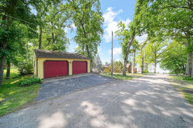 5027 Belemere Ct, Manitou Beach, MI 49253 - view of detached garage