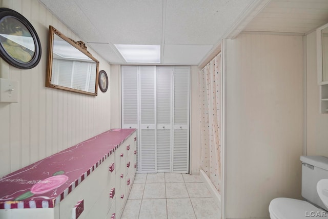 5027 Belemere Ct, Manitou Beach, MI 49253 - full bath with toilet and tile patterned floors