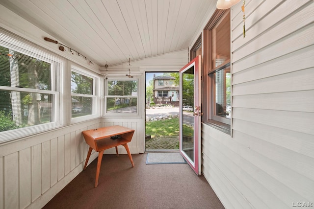 5027 Belemere Ct, Manitou Beach, MI 49253 - unfurnished sunroom featuring vaulted ceiling