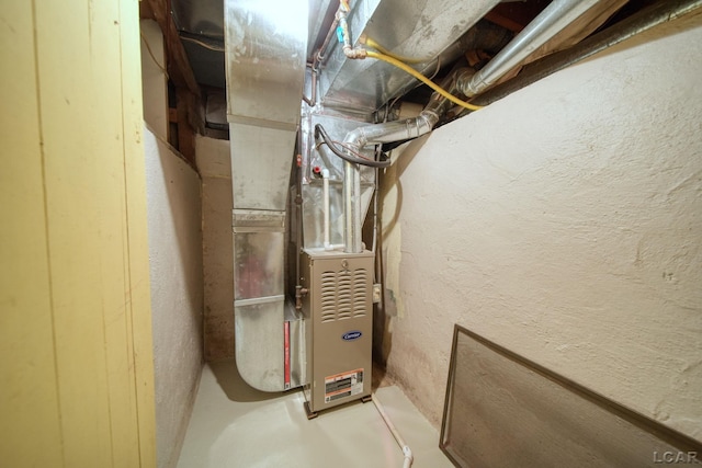 5027 Belemere Ct, Manitou Beach, MI 49253 - utility room with heating unit