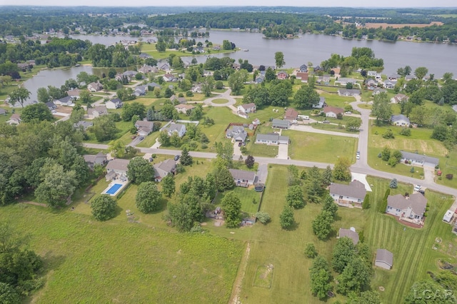 7673 Dalton Rd, Onsted, MI 49265 - aerial perspective of suburban area with a large body of water