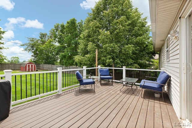 7673 Dalton Rd, Onsted, MI 49265 - wooden terrace featuring a storage shed and a fenced backyard