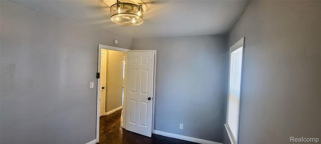 18978 Indiana St, Detroit, MI 48221 - unfurnished room featuring baseboards and dark wood-style floors