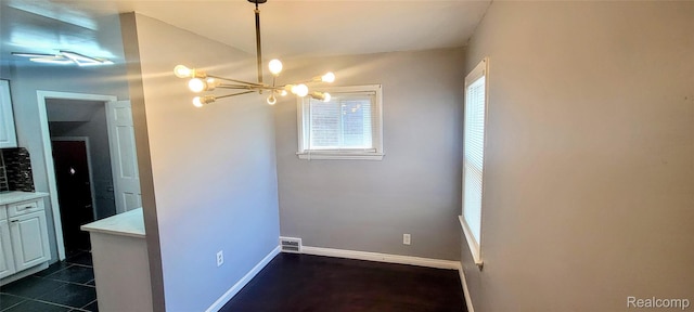 18978 Indiana St, Detroit, MI 48221 - spare room featuring a chandelier and baseboards