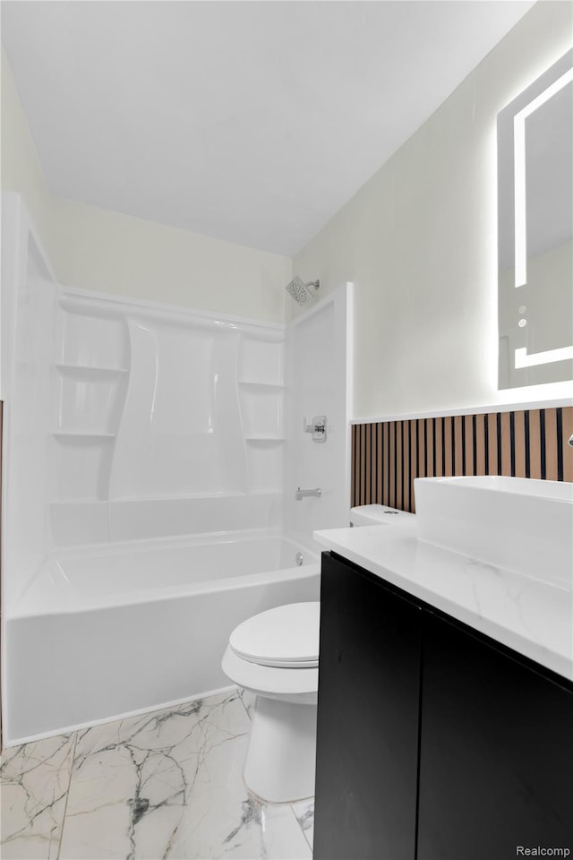 20120 Norwood St, Detroit, MI 48234 - bathroom with vanity, tub / shower combination, and marble look tiles