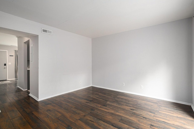 3539 Kenbrooke Ct, Kalamazoo, MI 49006 - empty room with dark wood-style floors and baseboards
