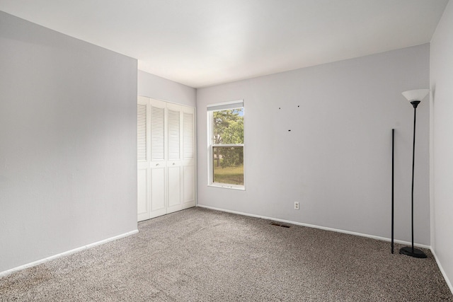 3539 Kenbrooke Ct, Kalamazoo, MI 49006 - unfurnished bedroom with carpet flooring and a closet