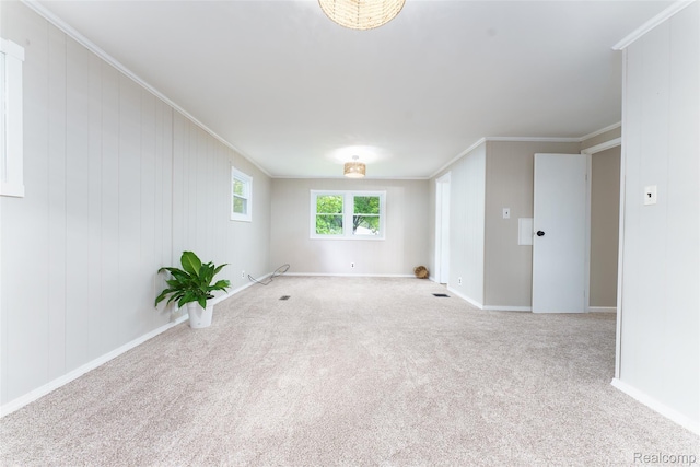 5806 Commanche Ln, Howell, MI 48843 - carpeted spare room featuring ornamental molding and baseboards