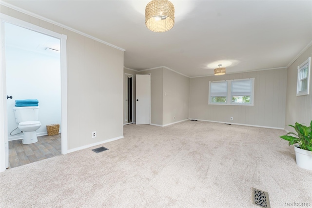 5806 Commanche Ln, Howell, MI 48843 - unfurnished room with carpet flooring and crown molding