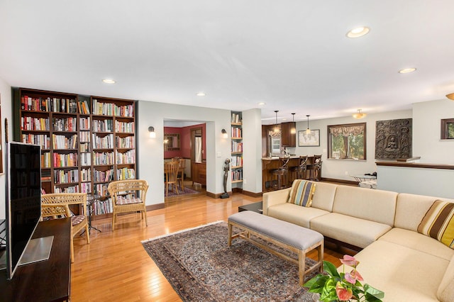 1506 Shadford Rd, Ann Arbor, MI 48104 - living area featuring wood finished floors and recessed lighting