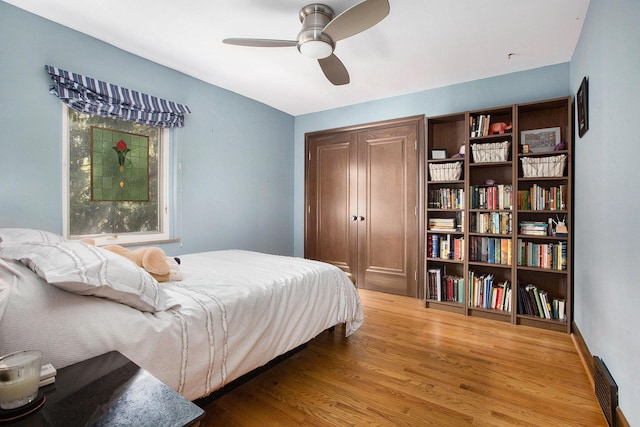 1506 Shadford Rd, Ann Arbor, MI 48104 - bedroom with wood finished floors, a closet, and ceiling fan