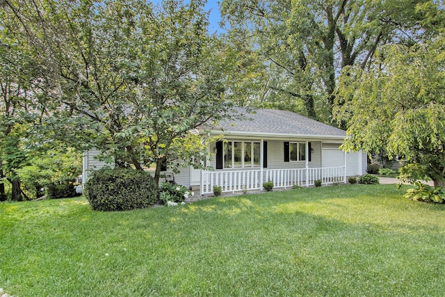 4760 Briarhill Dr, Portage, MI 49024 - view of front of property with covered porch, a garage, a front lawn, and roof with shingles