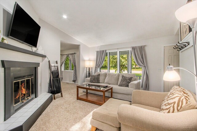 4760 Briarhill Dr, Portage, MI 49024 - living area featuring lofted ceiling, a fireplace, carpet floors, healthy amount of natural light, and recessed lighting
