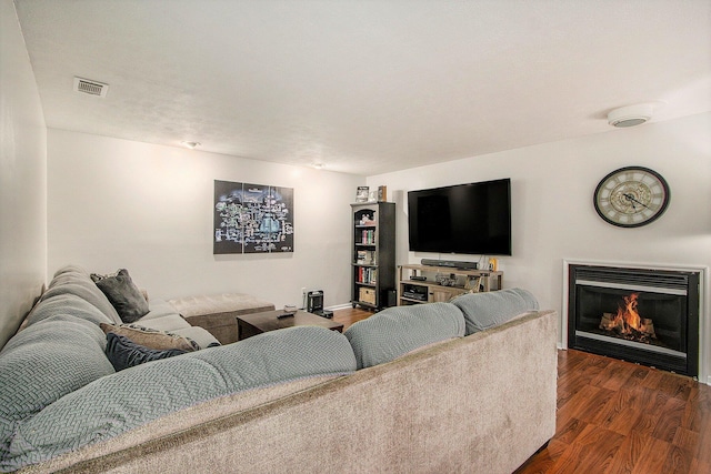 4760 Briarhill Dr, Portage, MI 49024 - living room with wood finished floors and a glass covered fireplace