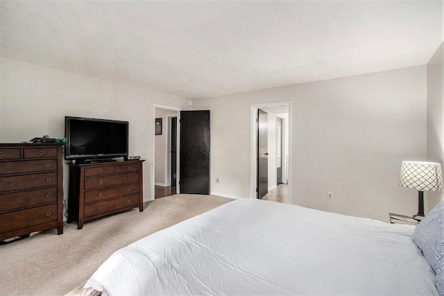 4760 Briarhill Dr, Portage, MI 49024 - bedroom with light colored carpet and baseboards