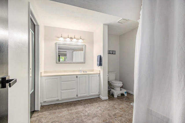 4760 Briarhill Dr, Portage, MI 49024 - bathroom featuring vanity and toilet