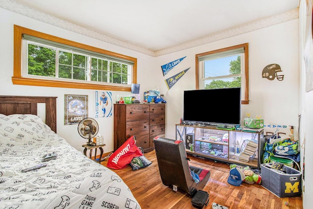 201 Beaumont Dr, Battle Creek, MI 49014 - bedroom with wood finished floors and crown molding