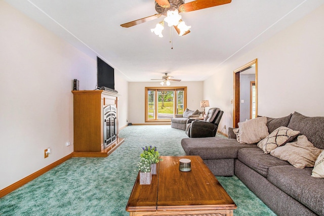 201 Beaumont Dr, Battle Creek, MI 49014 - living room with carpet floors, ceiling fan, and a fireplace with raised hearth